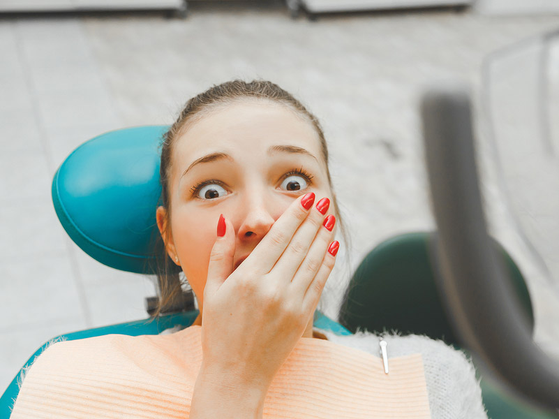 A lady afraid of dentist