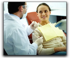 Lady given a smile to a dentist