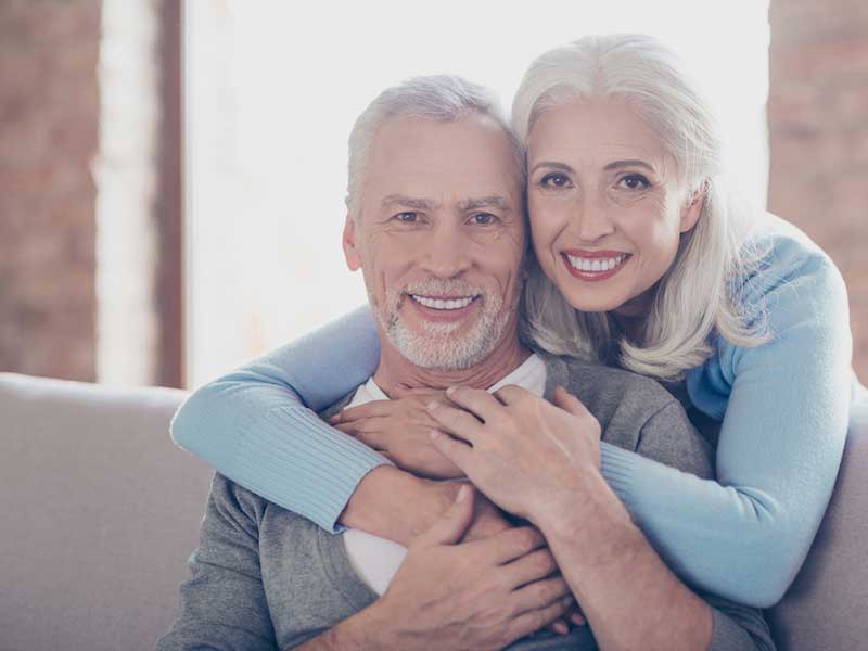 Close up portrait of two happy old