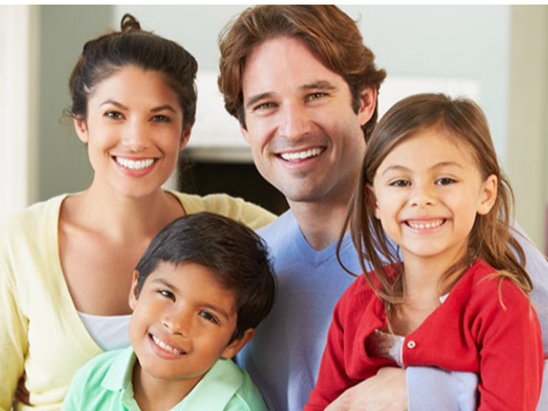 young family smiling